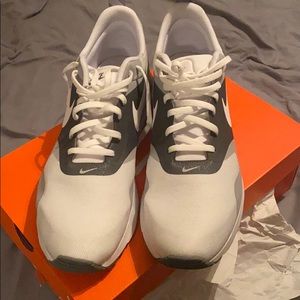 White nike running shoes